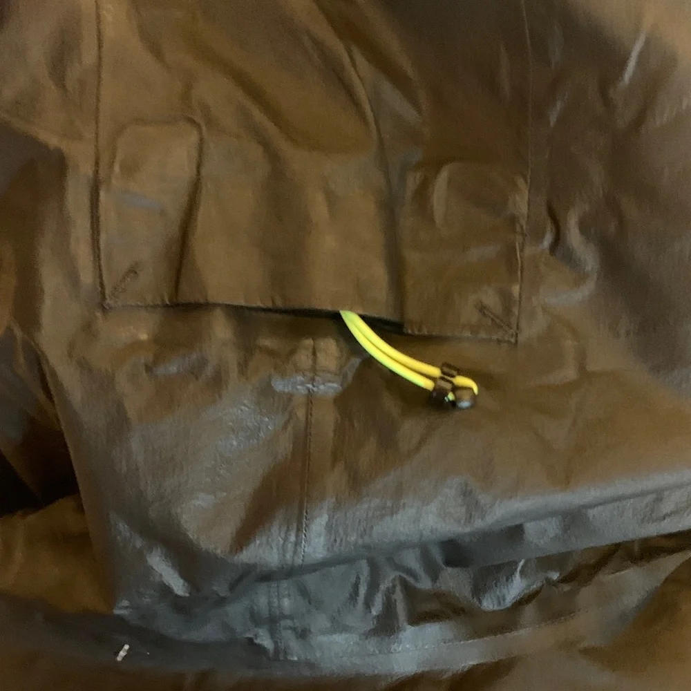 The North Face Men's Black Raincoat with Bright Yellow Zipper